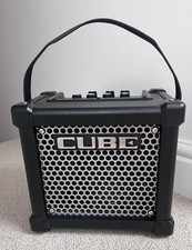 Roland M-CUBE GX portable guitar amp, power adaptor, cables and manual