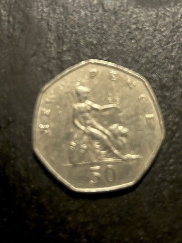 Old large 50p - coins, dated