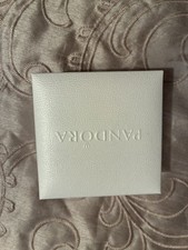 Pandora 3.5” square box with black velour cushion inserts