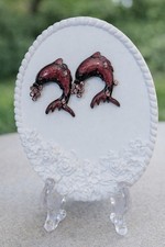 "Stunning dolphin earrings