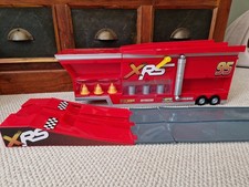 Disney Pixar Cars XRS Mack Truck Trailer With Racing Ramp