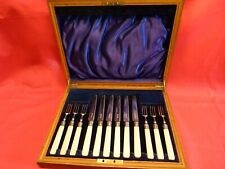 SUPERB 1923, 12 PCE CASED CUTLERY,SILVER TINES,BLADES,WITH FAUX BONE HANDLES.