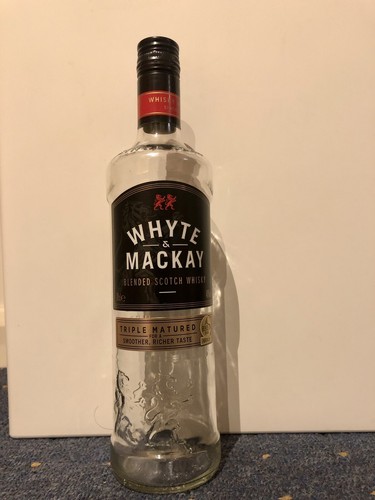 Empty glass bottle blended - glass, of