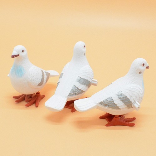 Clockwork jumping pigeon toy - pigeon,