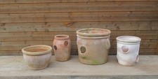 Group of 3 weathered terracotta clay strawberry herb garden planters & a pot