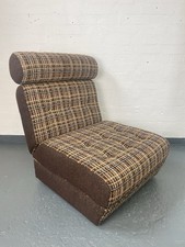 Vintage lounge chair which transform into a compact bed