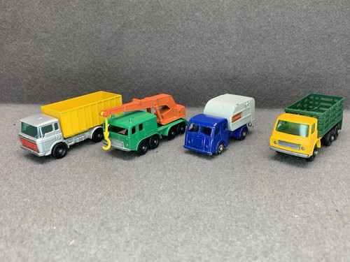 Four vintage matchbox trucks - four,