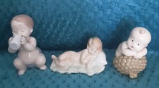 1 Lladro 2 Nao babies "baby lying down" "one with feeding bottle" "one in acorn"