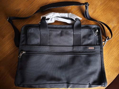New tumi black - tumi,
