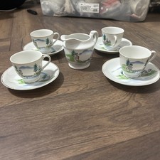 Geisha tea cups and saucers. Set Of 4 and 1 jug Beautiful decorated