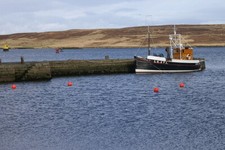 Photo 6x4 Pilot Us, Lerwick A boat moored at the small dock in front of t c2009