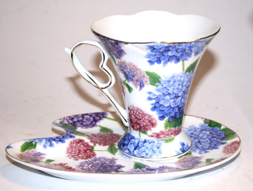 Floral themed cup - and, saucer