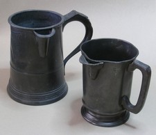 Two Antique Pewter Ale Jugs