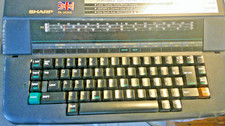 Vintage Sharp Electronic Typewriter inc Manual &  Spare Correctable Ribbon Works
