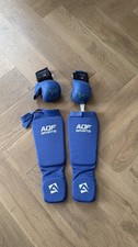 Small gloves and leg guards - gloves,