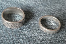 Two silver rings Yin & Yang and Live Love Laugh