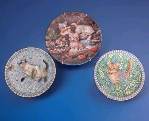 Three cat lovers collectors - three,