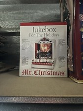 IOB Mr Christmas  Jukebox Projector 12 Rock Songs VIDEO