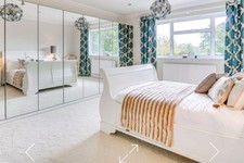 off white wooden double sleigh bed