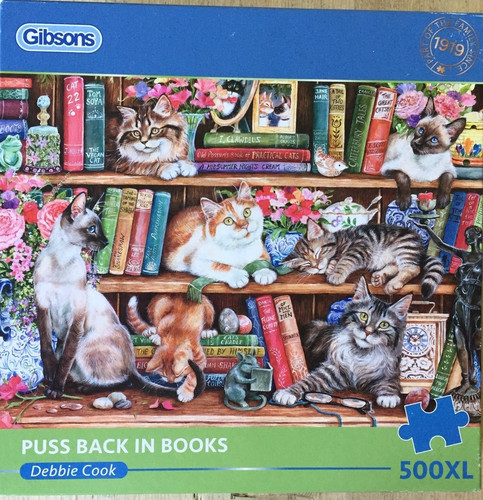 Puss back books - in,