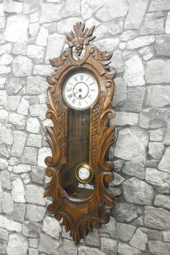 Antique wooden wall clock