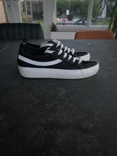 Black & white canvas trainers