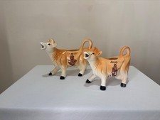 Two Vintage Ceramic Jersey Cow Milk Jugs 