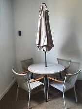Habitat Malta 4 Seater Patio Table, Parasol And 4 Chairs. Delivery available.