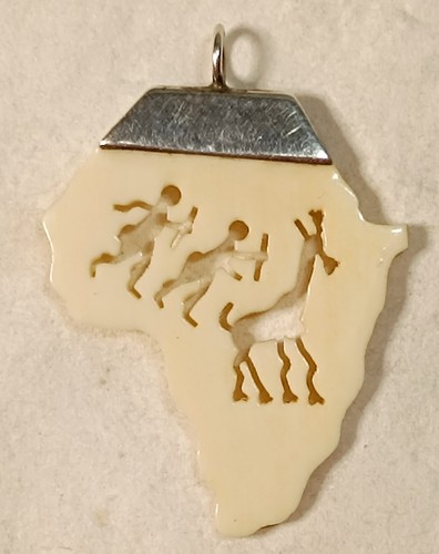 Hand carved polished cow - cow, bone
