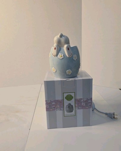 Curious cottontail warmer - curious,