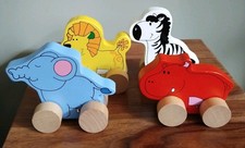 Ser of 4 Wooden Push Along Toys Elephant Lion Hipp Zebra