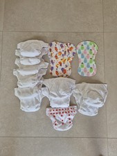 Bum Genius adjustable reusuable nappies with extra inserts and liners. 