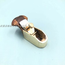 Thumb brass convex bottom