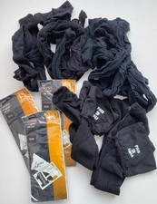 A selection of 9 pairs of unused ladies black stockings