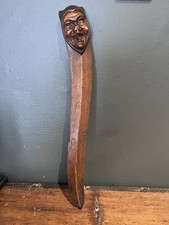 Antique Carved Devil Page