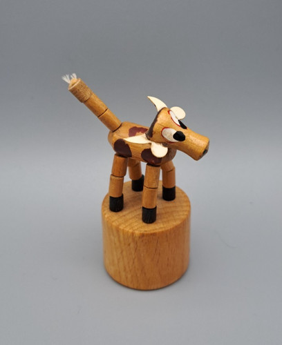 Cow wooden push button puppet