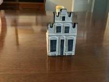 A KLM Blue Delft Miniature House, No. 76 with history