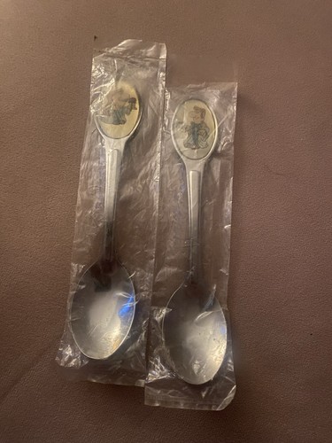 Two 1996 tetley teaspoons - two,