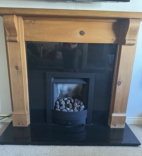 Oak fire surround with black - fire,