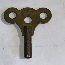 Vintage old solid Brass Mantel Clock Tame Side Winding Key size number 4