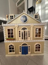 Victorian dolls house with furniture 
