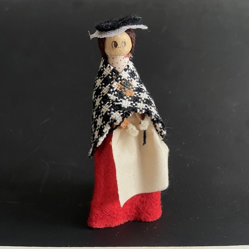 Vintage wooden peg doll with