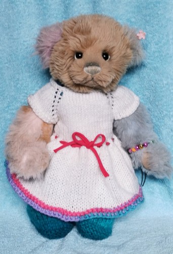 Hand knitted teddy bear