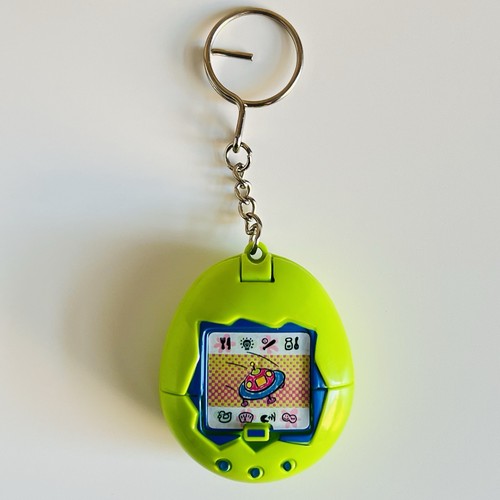 Vintage tamagotchi green - tamagotchi,