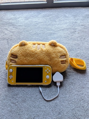 Nintendo switch lite yellow - nintendo,