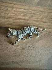 Gold-tone tiger brooch with