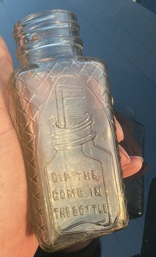 Two antique bottles dip the - antique,