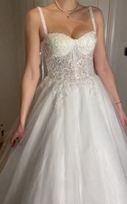 Brand new wedding dress with tags attached, size 8