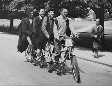 Four Cambridge students ride a