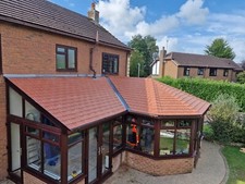 Lightweight conservatory  tiled roof with timber frame